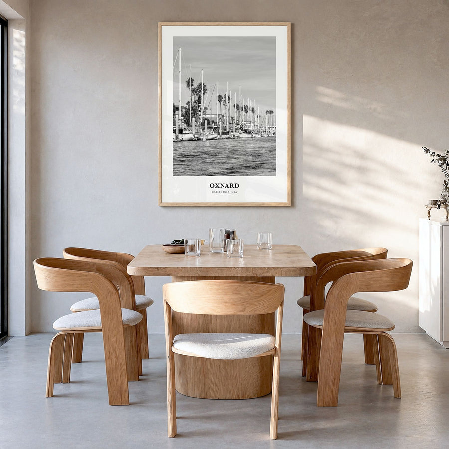 Oxnard Classic Poster in a natural wood frame, hanging in a dining room