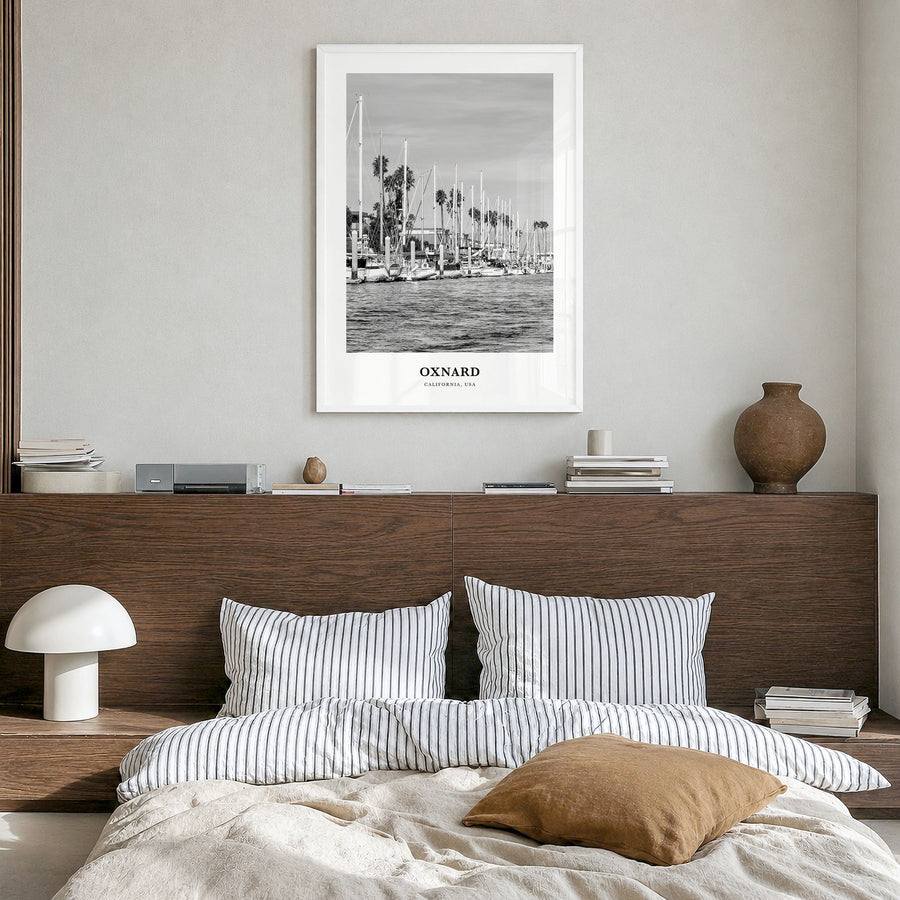 Oxnard Classic Poster in a white wood frame, hanging in a bedroom