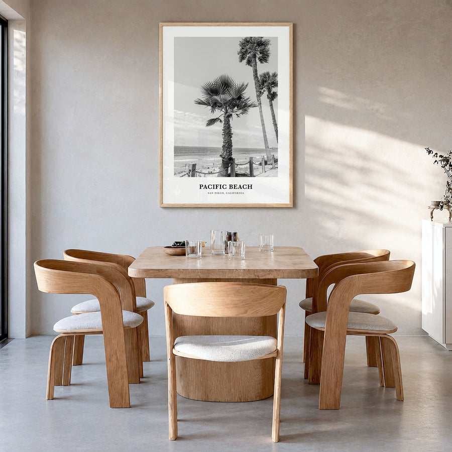 Pacific Beach Classic No 1 Poster in a natural wood frame, hanging in a dining room