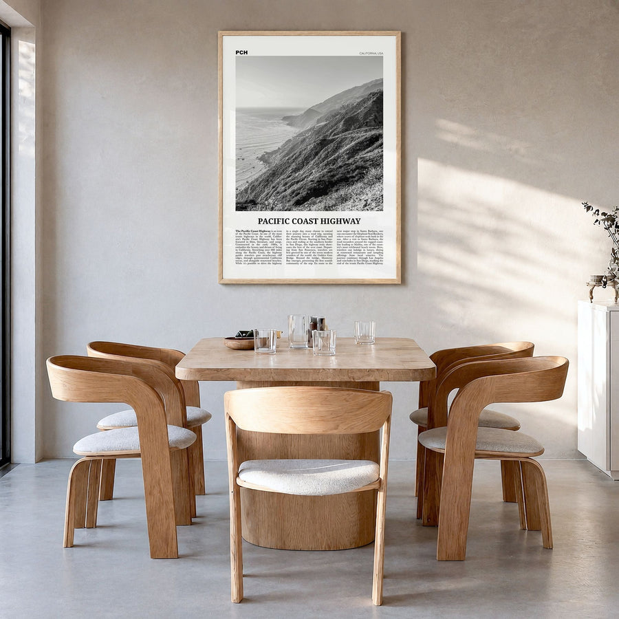 Pacific Coast Highway Newspaper No 3 Poster in a natural wood frame, hanging in a dining room
