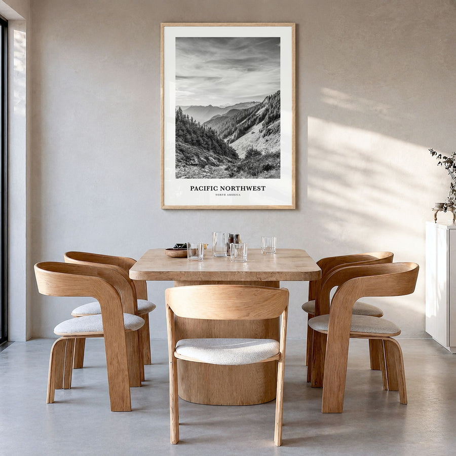 Pacific Northwest Classic Poster in a natural wood frame, hanging in a dining room