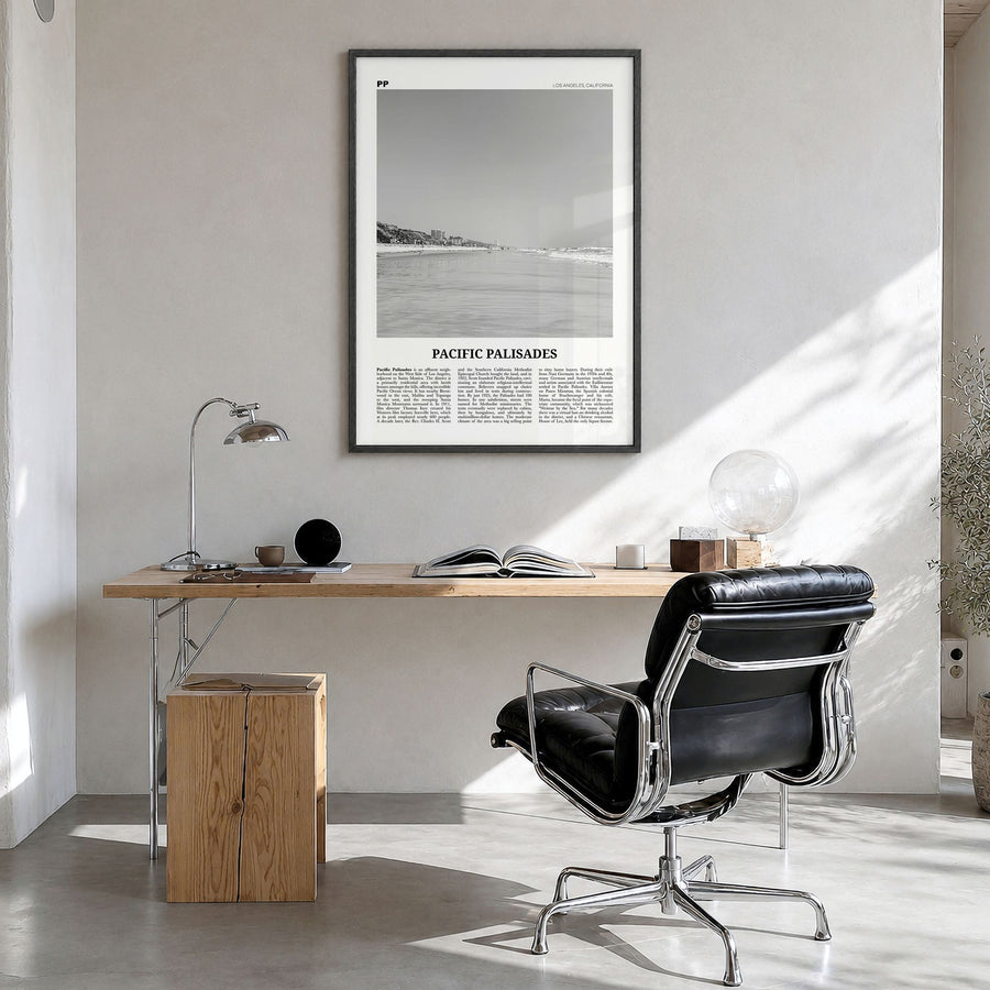 Pacific Palisades Newspaper Poster in a black wood frame, hanging in a bright home office