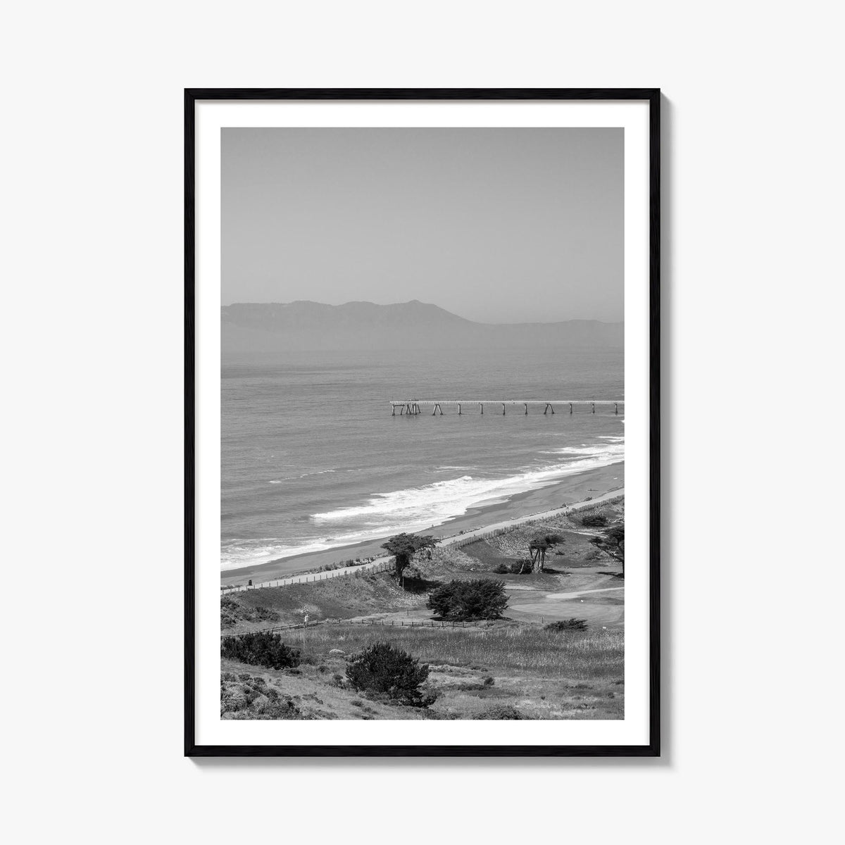 Pacifica black & white photo poster of California, USA – vertical wall art, unframed print shown in interior mockup