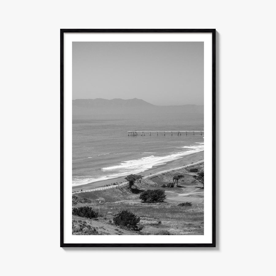 Pacifica black & white photo poster of California, USA – vertical wall art, unframed print shown in interior mockup