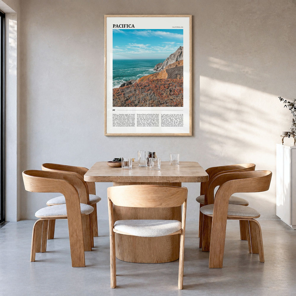 Pacifica Travel No 2 Poster in a natural wood frame, hanging in a dining room