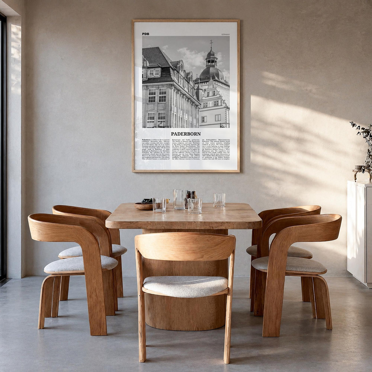 Paderborn black & white newspaper poster of Germany – vertical wall art in natural wood frame, hanging on wall