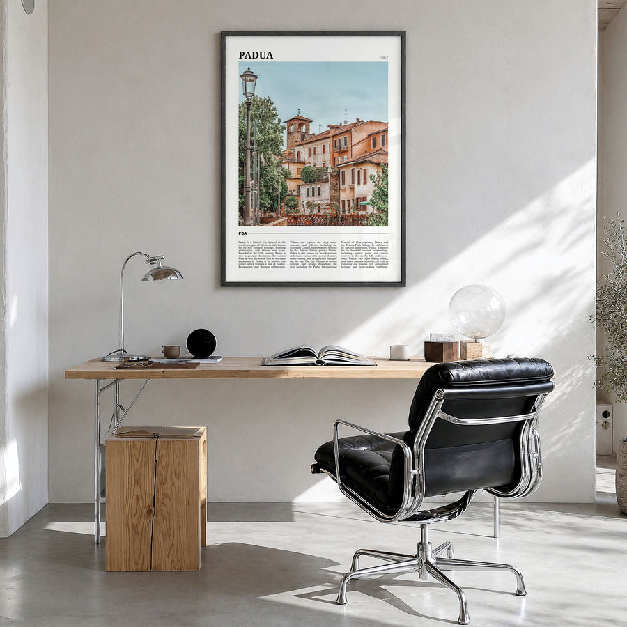 Padua Travel Poster in a black wood frame, hanging in a bright home office