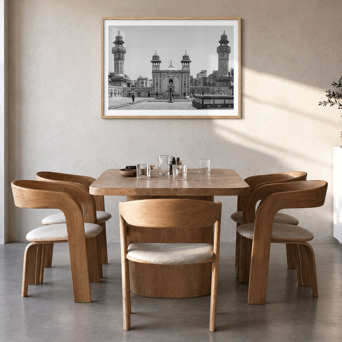 Pakistan Photo Poster in a natural wood frame, hanging in a dining room, white border