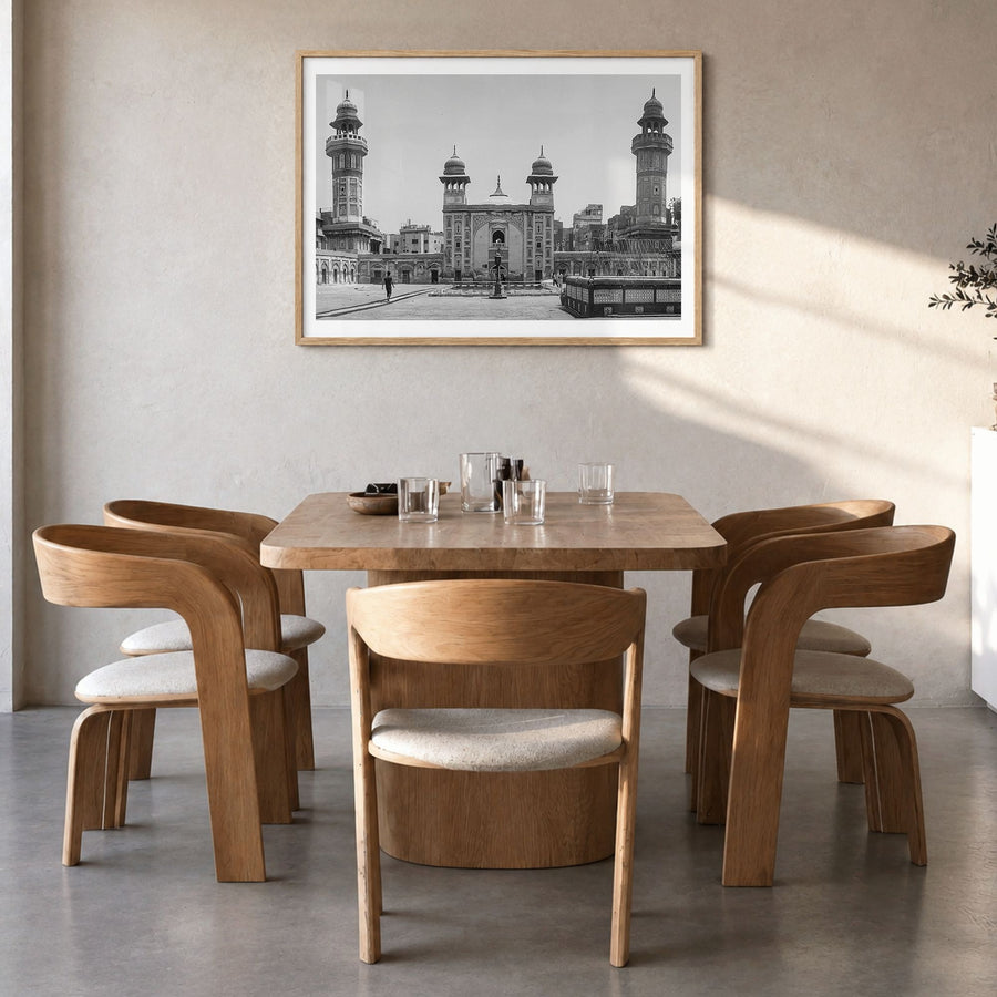 Pakistan Photo Poster in a natural wood frame, hanging in a dining room, white border