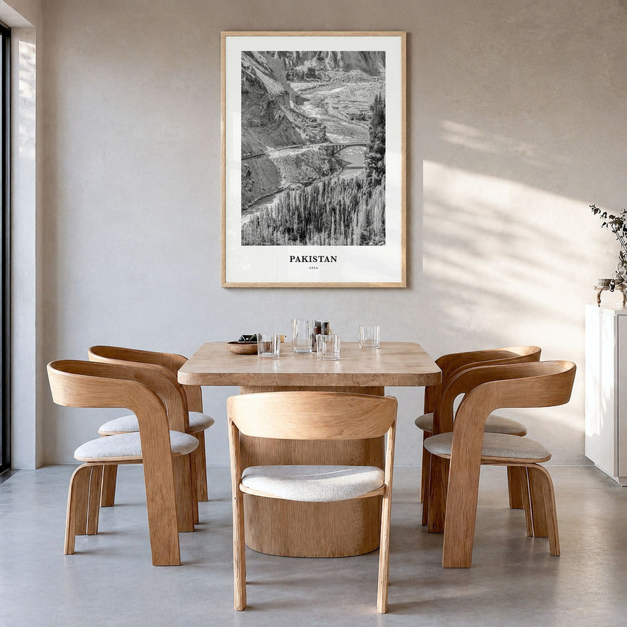 Pakistan Classic No 1 Poster in a natural wood frame, hanging in a dining room