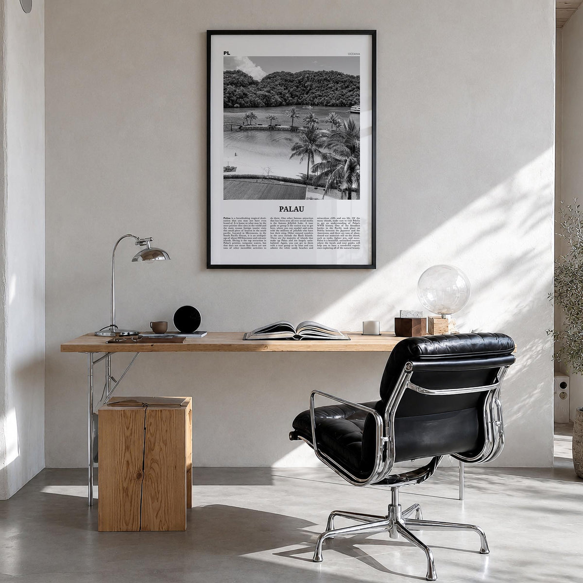 Palau black & white newspaper poster of Oceania – vertical wall art in black wood frame, hanging on wall