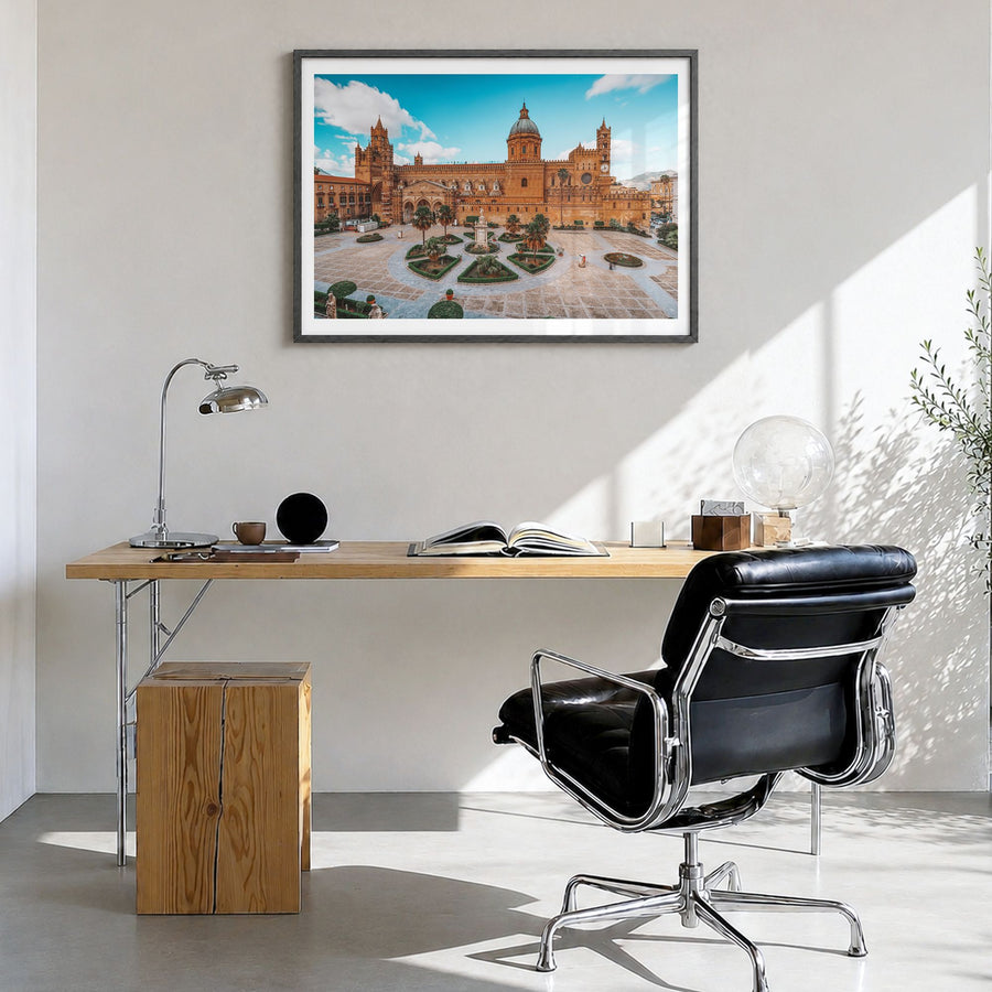 Palermo Photo Poster in a black wood frame, hanging in a bright home office, white border
