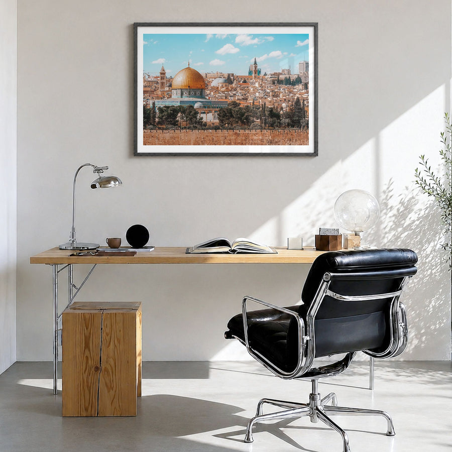 Palestine Photo Poster in a black wood frame, hanging in a bright home office, white border