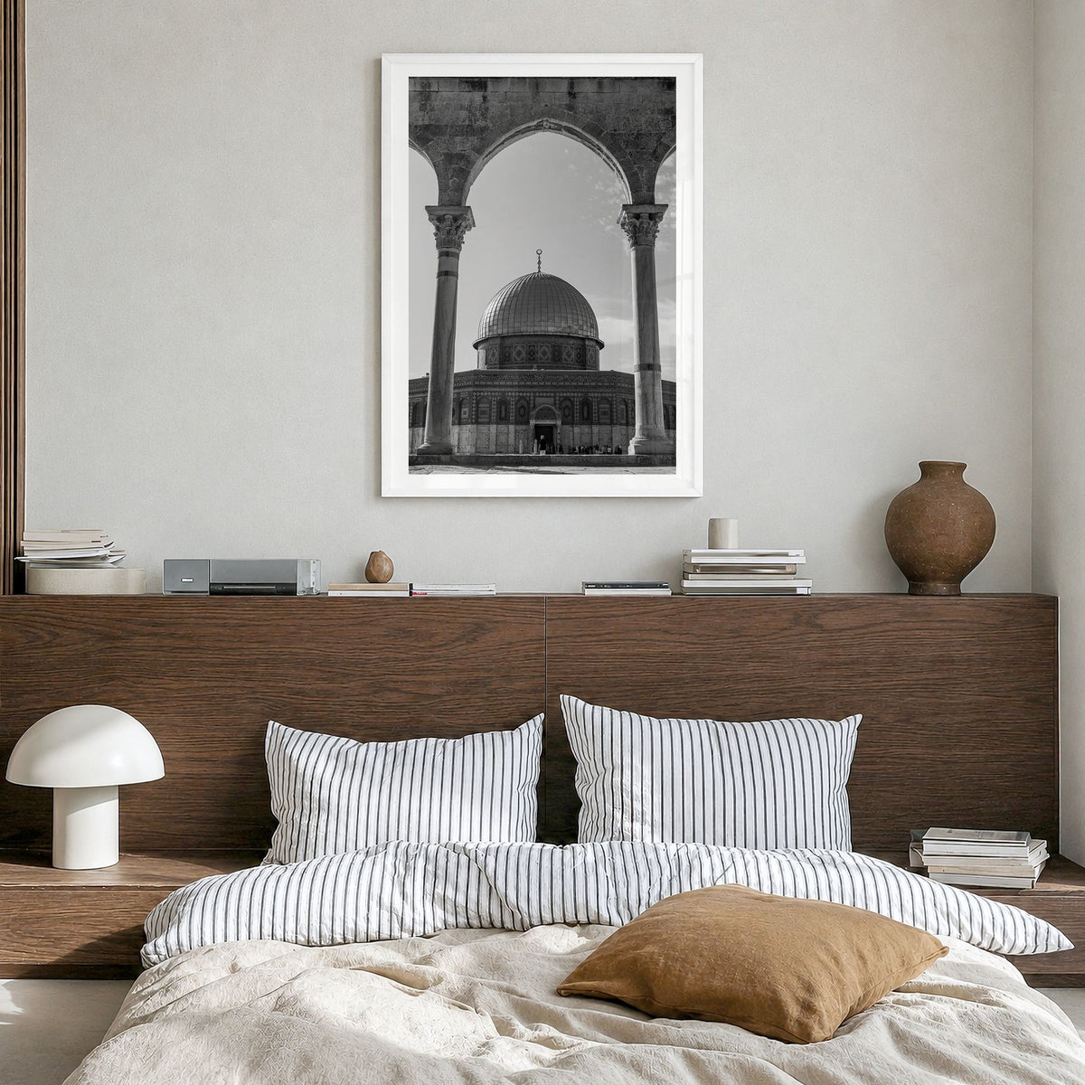 Palestine Photo Poster in a white wood frame, hanging in a bedroom, white border
