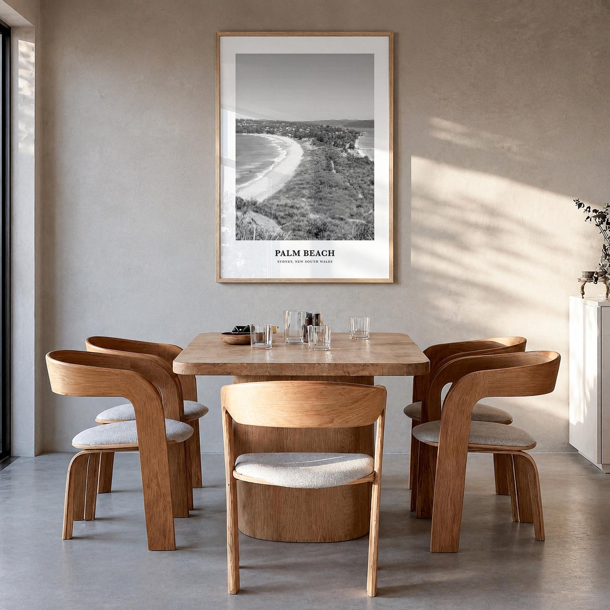 Palm Beach, New South Wales black & white classic poster of Australia – vertical wall art in natural wood frame, hanging on w