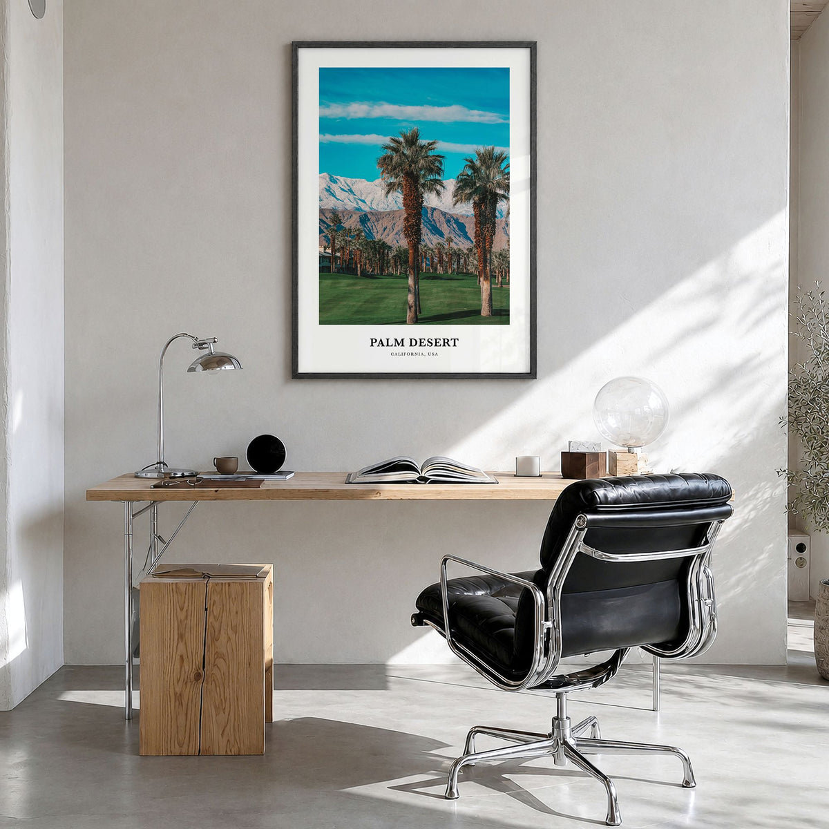 Palm Desert Classic Poster in a black wood frame, hanging in a bright home office