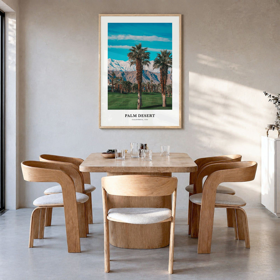 Palm Desert Classic Poster in a natural wood frame, hanging in a dining room