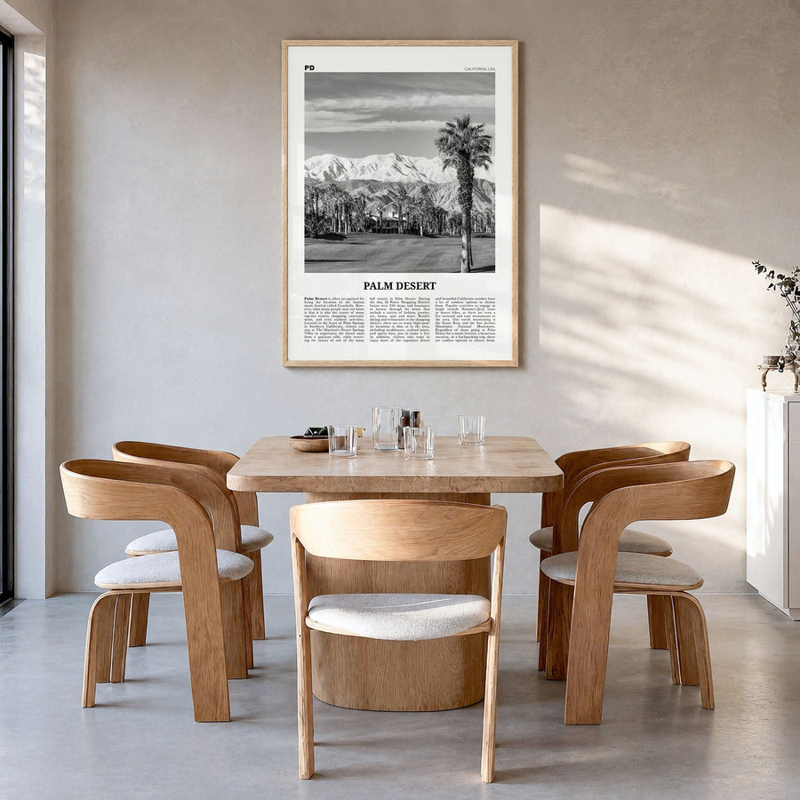 Palm Desert Newspaper Poster in a natural wood frame, hanging in a dining room