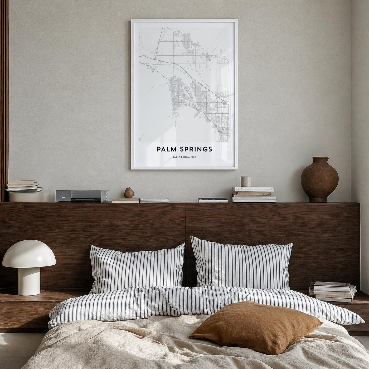 Palm Springs black & white map poster of California, USA – vertical wall art in white wood frame, hanging on wall