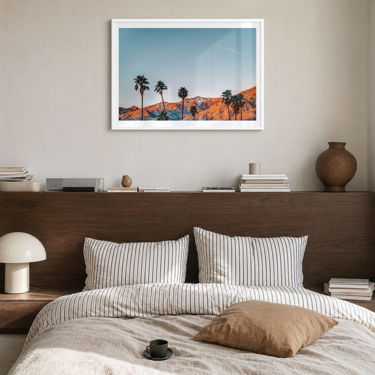 Palm Springs Photo Poster in a white wood frame, hanging in a bedroom, white border