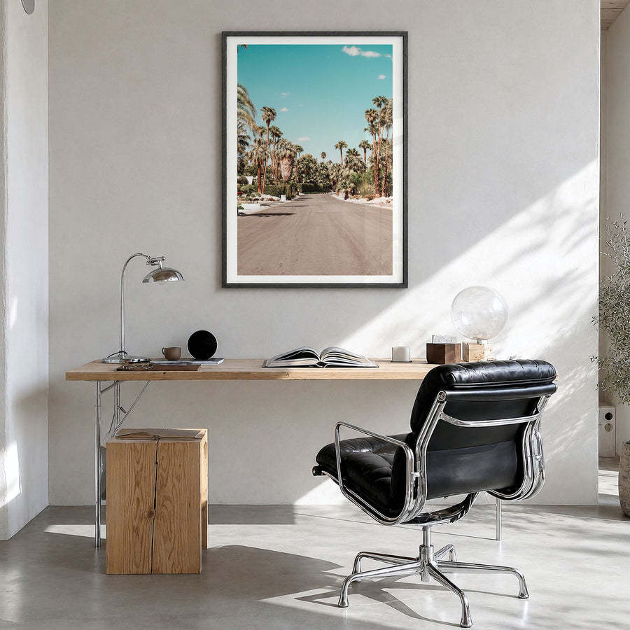 Palm Springs Photo No 1 Poster in a black wood frame, hanging in a bright home office, white border