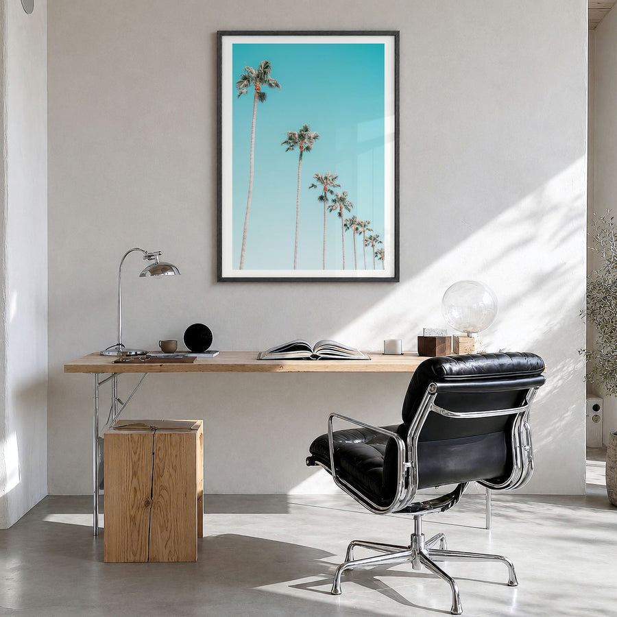 Palm Trees Photo No 3 Poster in a black wood frame, hanging in a bright home office, white border