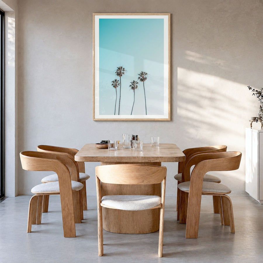 Palm Trees Photo No 7 Poster in a natural wood frame, hanging in a dining room, white border