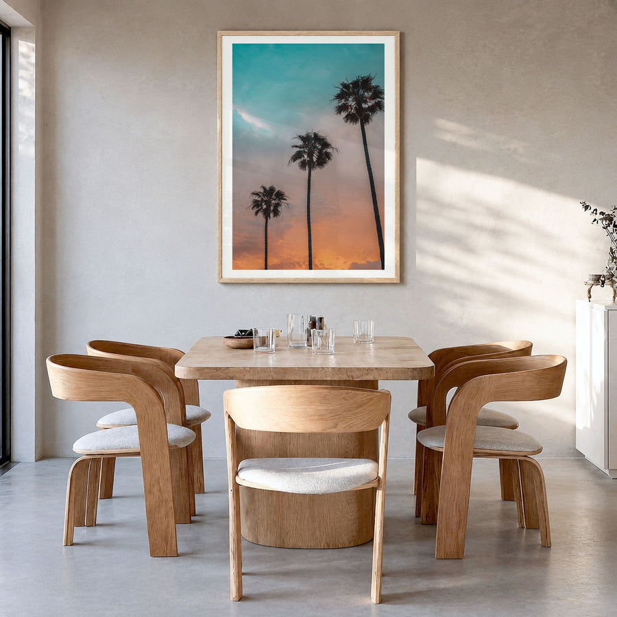 Palm Trees Photo No 9 Poster in a natural wood frame, hanging in a dining room, white border
