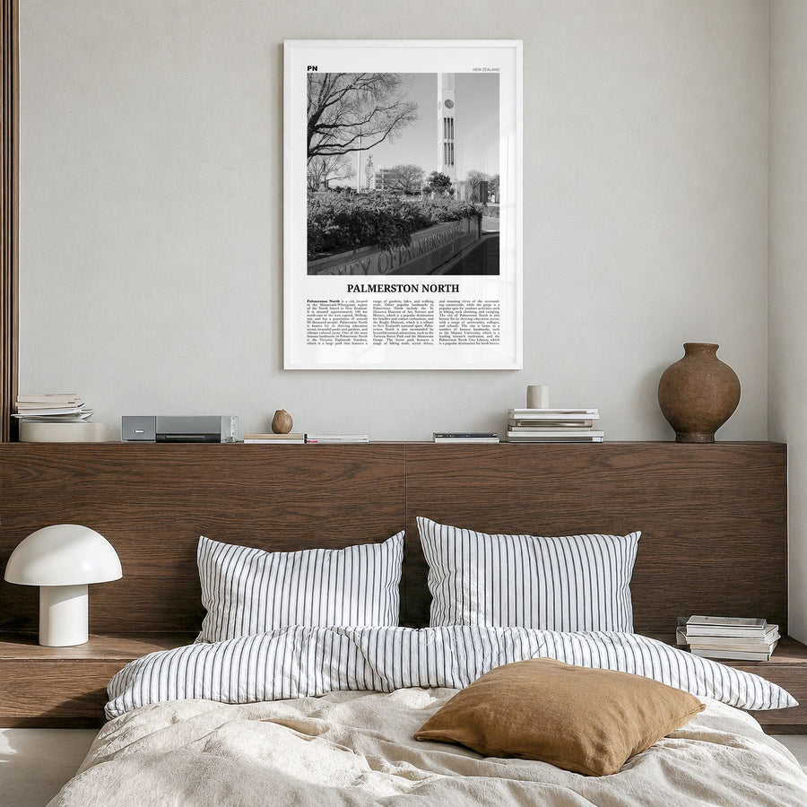 Palmerston North Newspaper Poster in a white wood frame, hanging in a bedroom