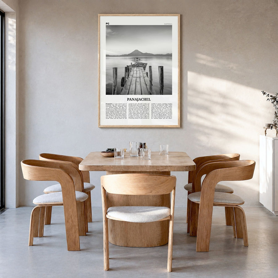 Panajachel Newspaper Poster in a natural wood frame, hanging in a dining room