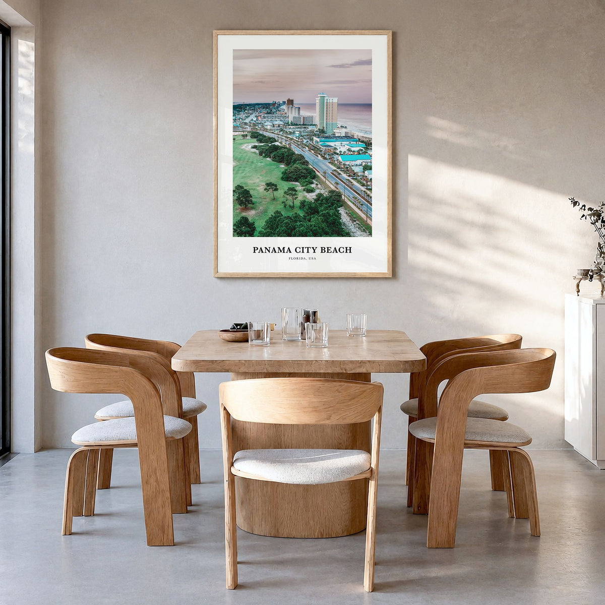 Panama City Beach, Florida Classic Poster in a natural wood frame, hanging in a dining room