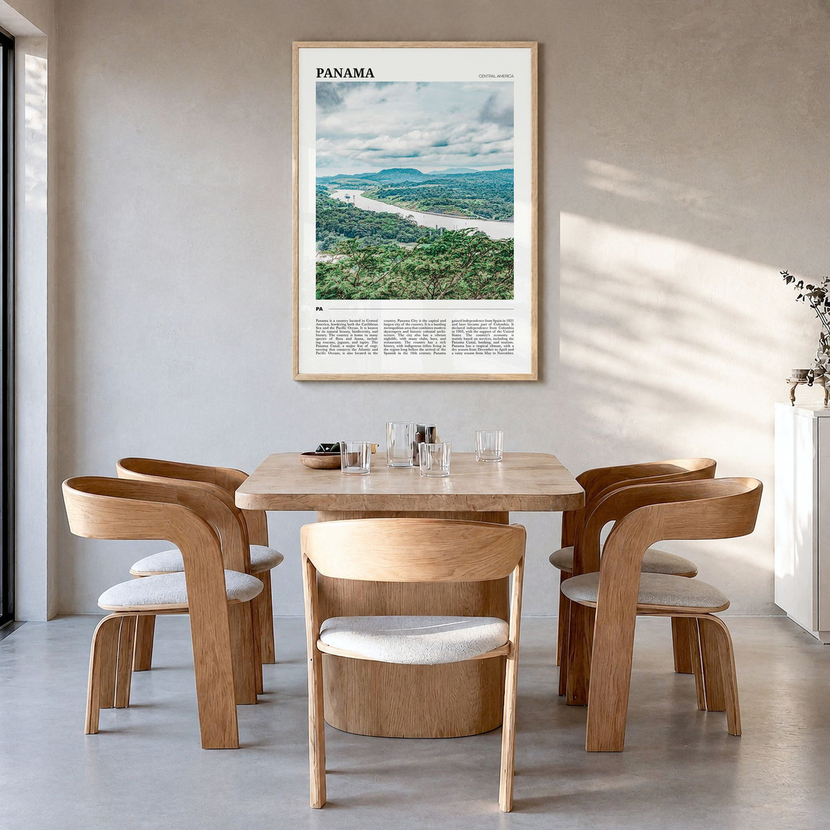 Panama Travel Poster in a natural wood frame, hanging in a dining room