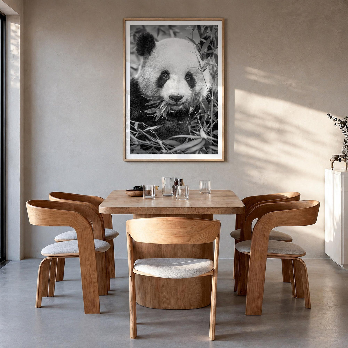 Panda Bear no. 1 black & white photo poster – vertical wall art in natural wood frame with white border, hanging on wall