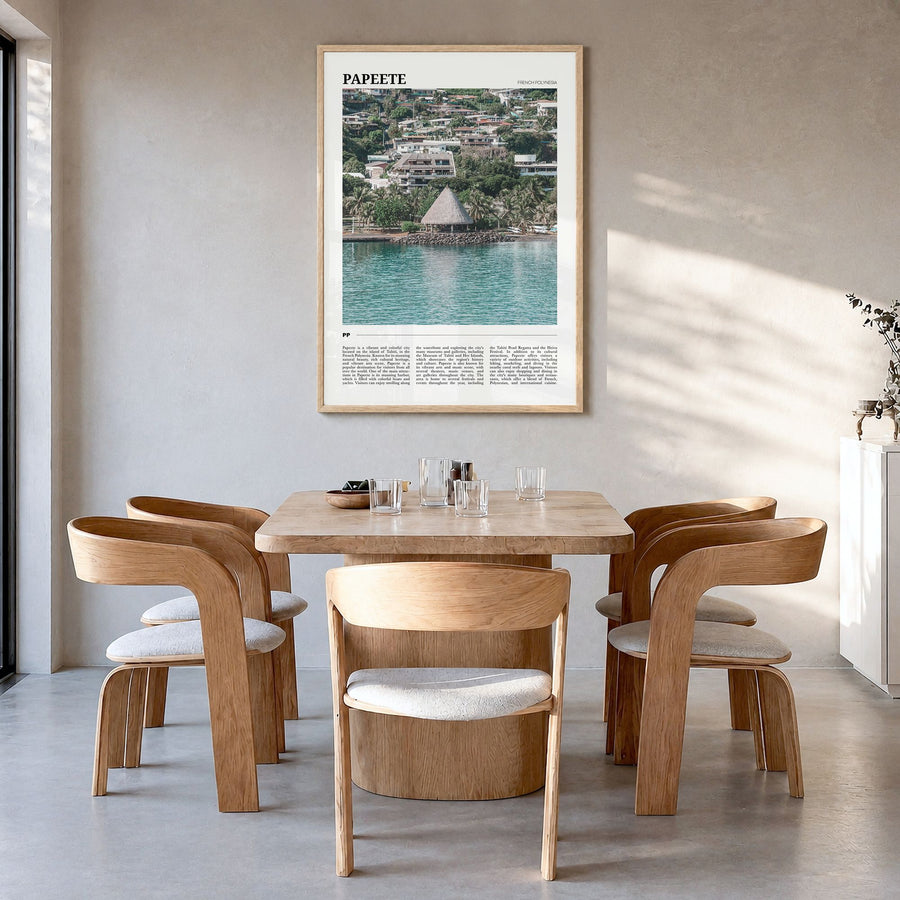 Papeete Travel Poster in a natural wood frame, hanging in a dining room