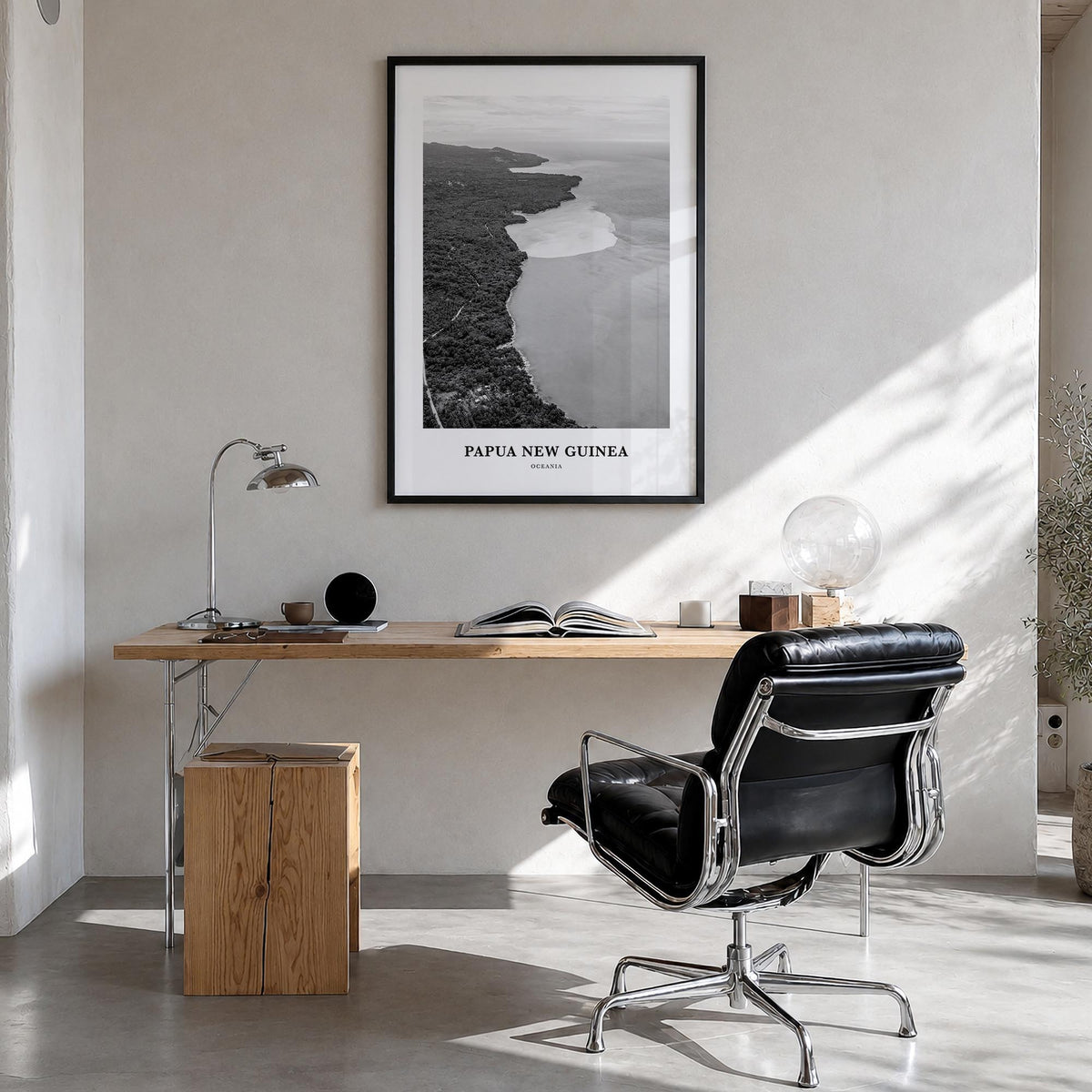 Papua New Guinea black & white classic poster of Oceania – vertical wall art in black wood frame, hanging on wall