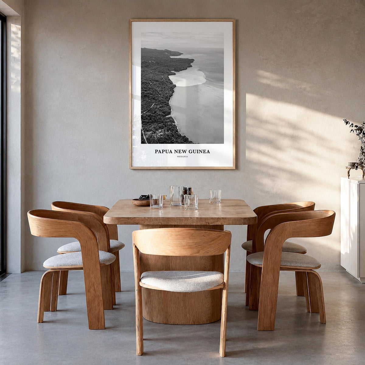 Papua New Guinea black & white classic poster of Oceania – vertical wall art in natural wood frame, hanging on wall