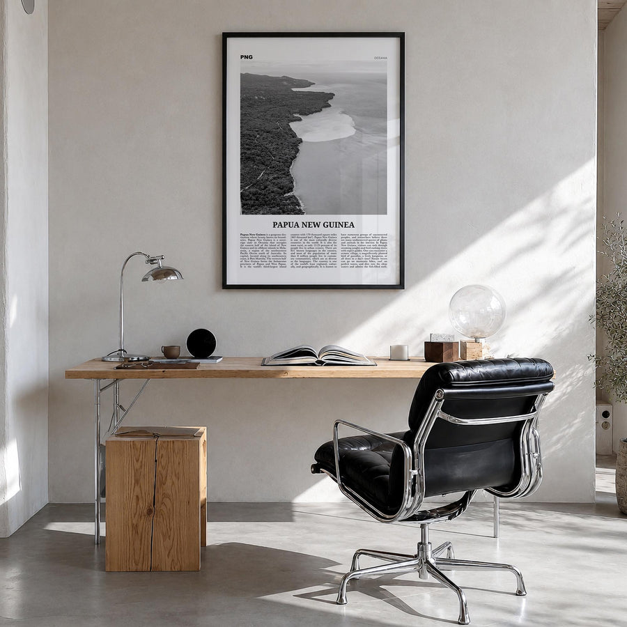 Papua New Guinea black & white newspaper poster of Oceania – vertical wall art in black wood frame, hanging on wall