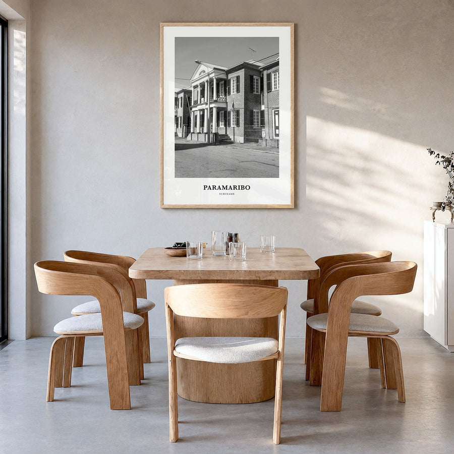 Paramaribo Classic Poster in a natural wood frame, hanging in a dining room