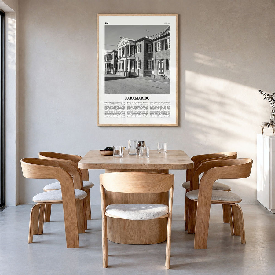 Paramaribo Newspaper Poster in a natural wood frame, hanging in a dining room