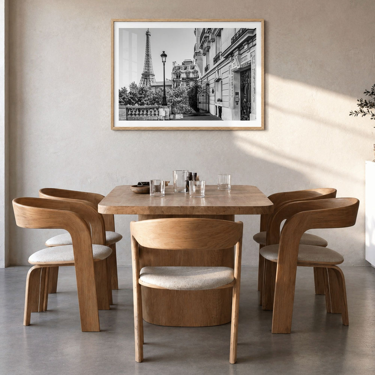 Paris Photo No 2 Poster in a natural wood frame, hanging in a dining room, white border