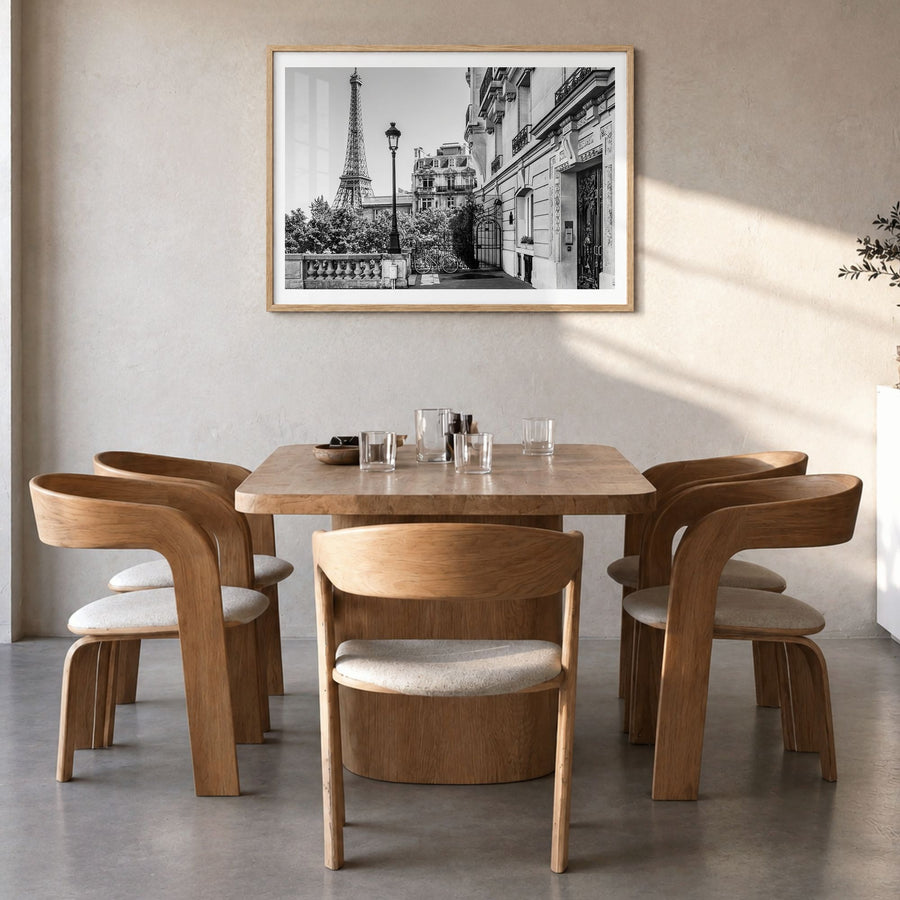 Paris Photo No 2 Poster in a natural wood frame, hanging in a dining room, white border