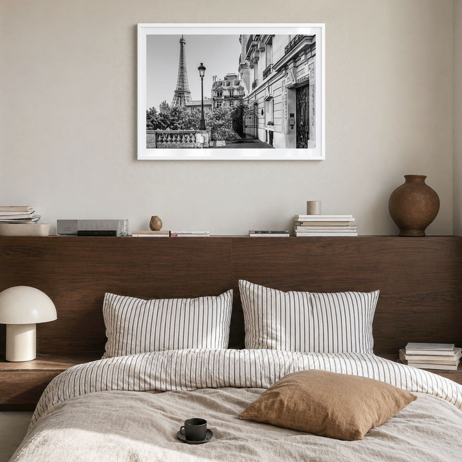 Paris Photo No 2 Poster in a white wood frame, hanging in a bedroom, white border