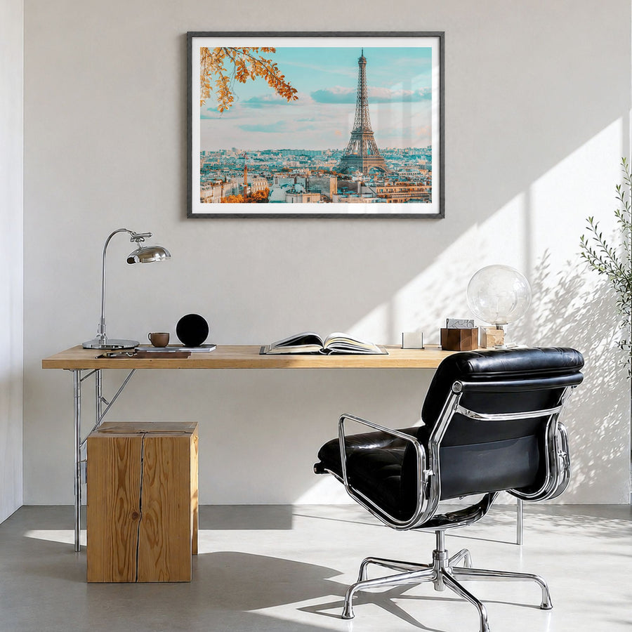 Paris Photo Poster in a black wood frame, hanging in a bright home office, white border