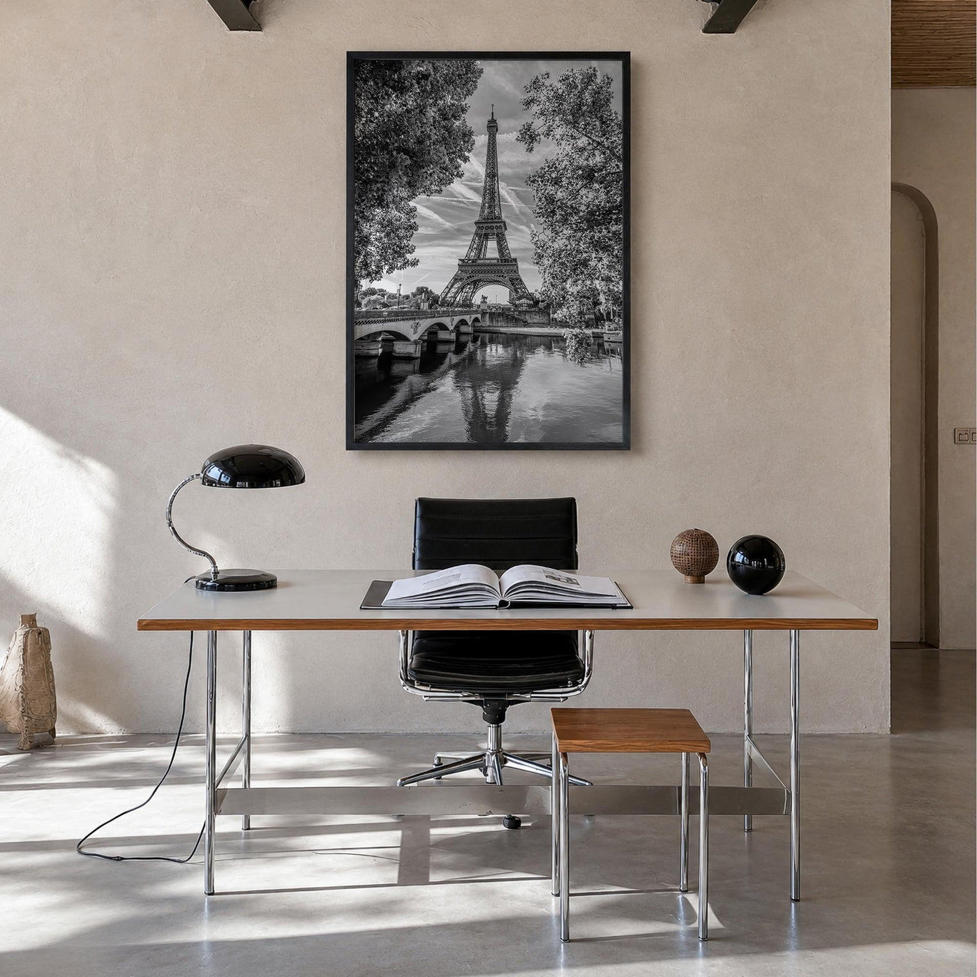 Paris no. 2 black & white photo poster of France – vertical wall art in black wood frame, hanging on wall