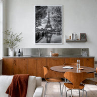 Paris no. 2 black & white photo poster of France – vertical wall art in white wood frame, hanging on wall