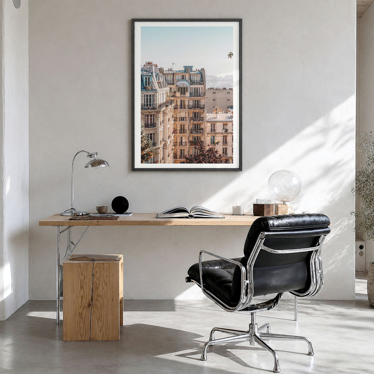 Paris Photo No 2 Poster in a black wood frame, hanging in a bright home office, white border