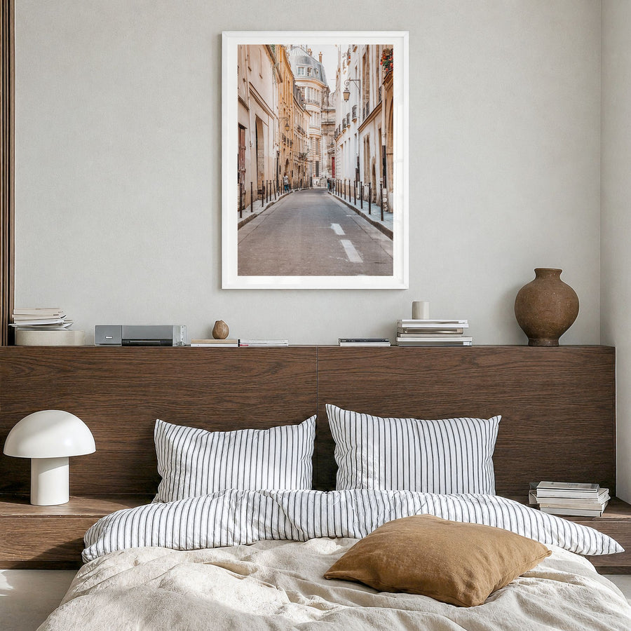 Paris Photo No 4 Poster in a white wood frame, hanging in a bedroom, white border