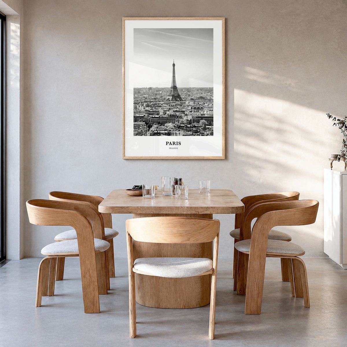 Paris Classic No 2 Poster in a natural wood frame, hanging in a dining room