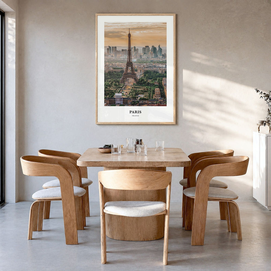 Paris Classic Poster in a natural wood frame, hanging in a dining room
