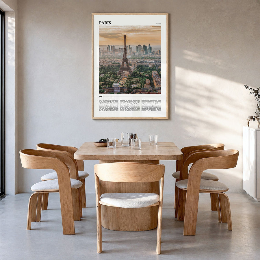 Paris Travel Poster in a natural wood frame, hanging in a dining room